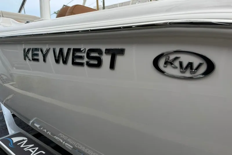 Slide: The Image of 2027 Key West 239 DFS boat logo and branding detail. - 52
