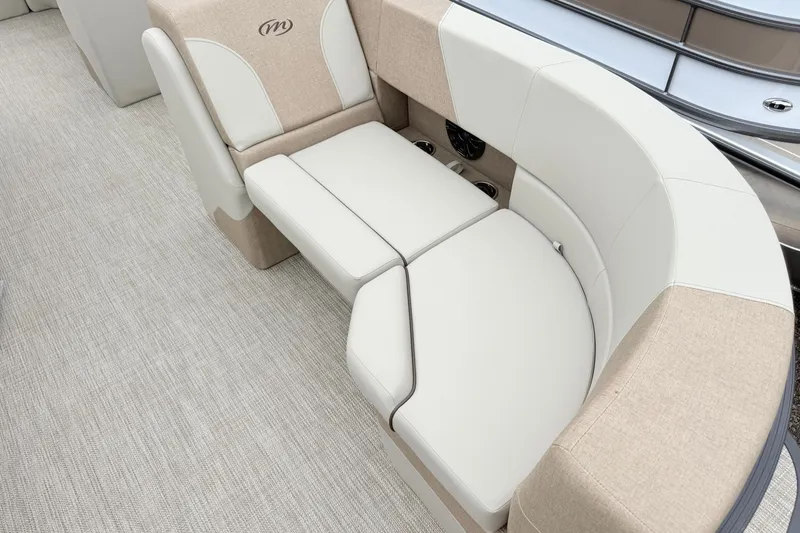 Slide: The Image of Luxurious seating on 2027 Manitou Aurora SE 21 pontoon boat, featuring elegant beige upholstery. - 4