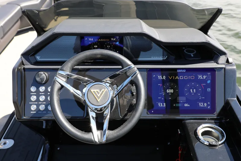 Slide: The Image of 2024 Viaggio D24U boat dashboard with advanced digital display and steering wheel. - 6