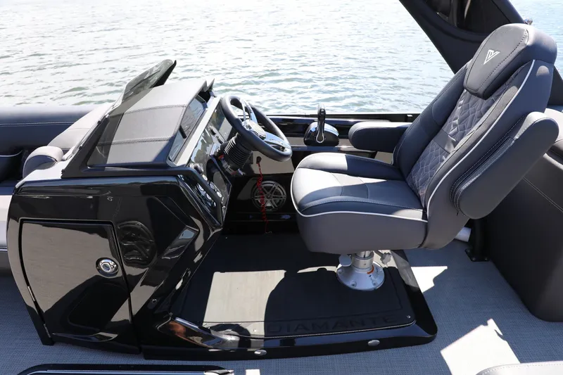 Slide: The Image of Luxurious 2024 Viaggio D24U boat cockpit with sleek black dashboard and plush captain's chair. - 4
