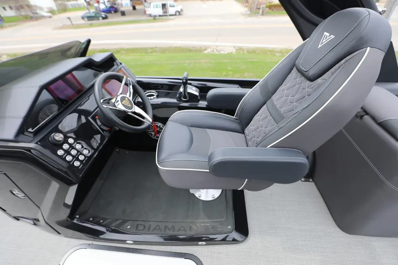 Slide: The Image of Luxurious 2024 Viaggio D24U boat cockpit with modern steering and plush seating. - 2