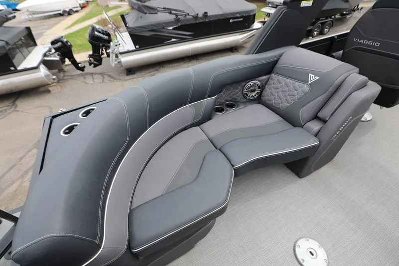 Slide: The Image of Luxurious seating on 2024 Viaggio D24U boat with stylish gray upholstery and cup holders. - 4