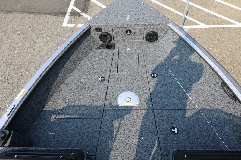 Slide: The Image of 2027 Lund 1875 Impact XS Sport boat deck with storage compartments and speaker system. - 17