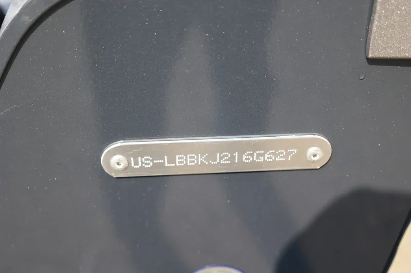 Slide: The Image of Hull identification number on 2027 Lund 1875 Impact XS Sport boat. - 47