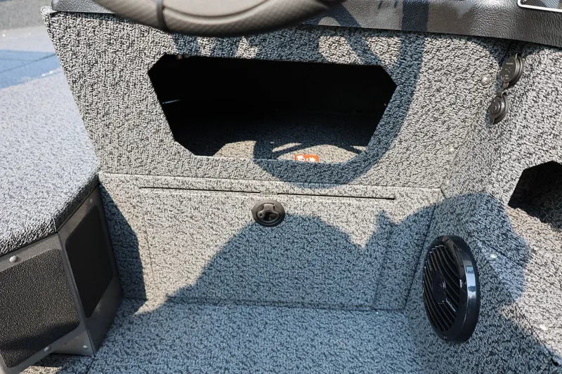 Slide: The Image of Interior view of 2027 Lund 1875 Impact XS Sport boat console area. - 29
