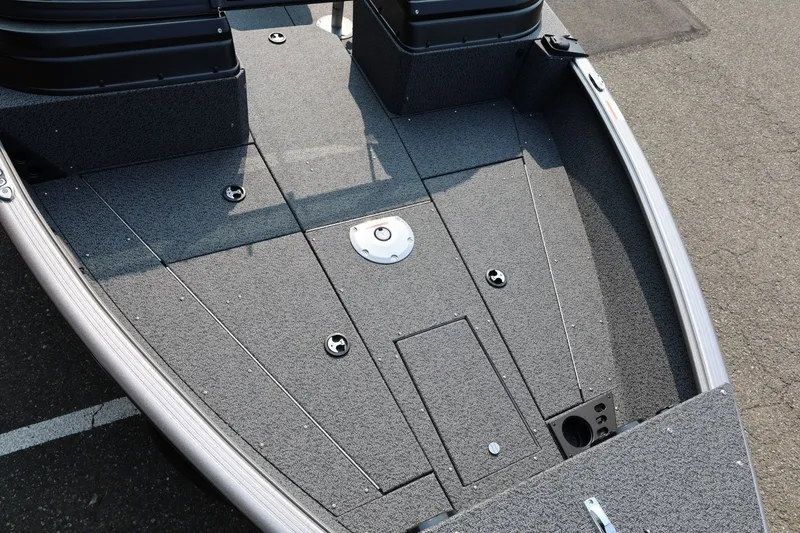 Slide: The Image of 2027 Lund 1875 Impact XS Sport boat deck with storage compartments and sleek design. - 15