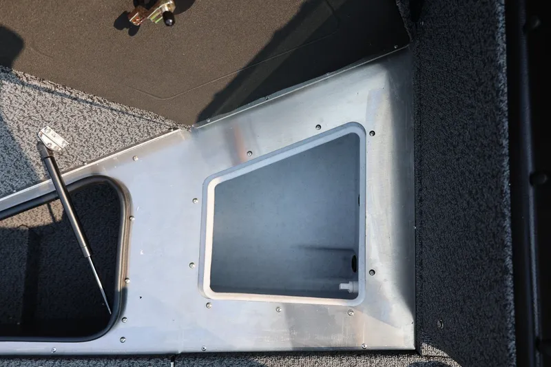 Slide: The Image of Interior view of 2027 Lund 1875 Impact XS Sport boat compartment. - 19