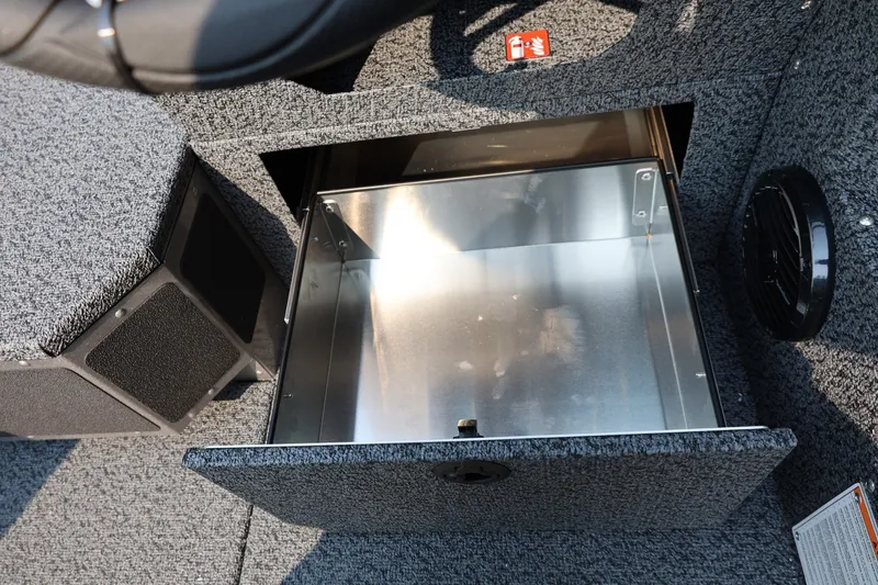 Slide: The Image of Open storage compartment in 2027 Lund 1875 Impact XS Sport boat interior. - 30