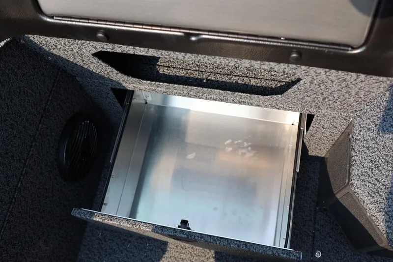 Slide: The Image of Open storage compartment in 2027 Lund 1875 Impact XS Sport boat interior. - 34