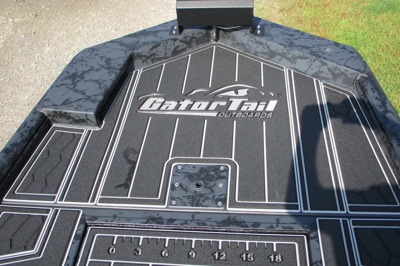 Slide: The Image of 2027 GatorTail 1854 Extreme boat deck with logo and textured surface. - 8