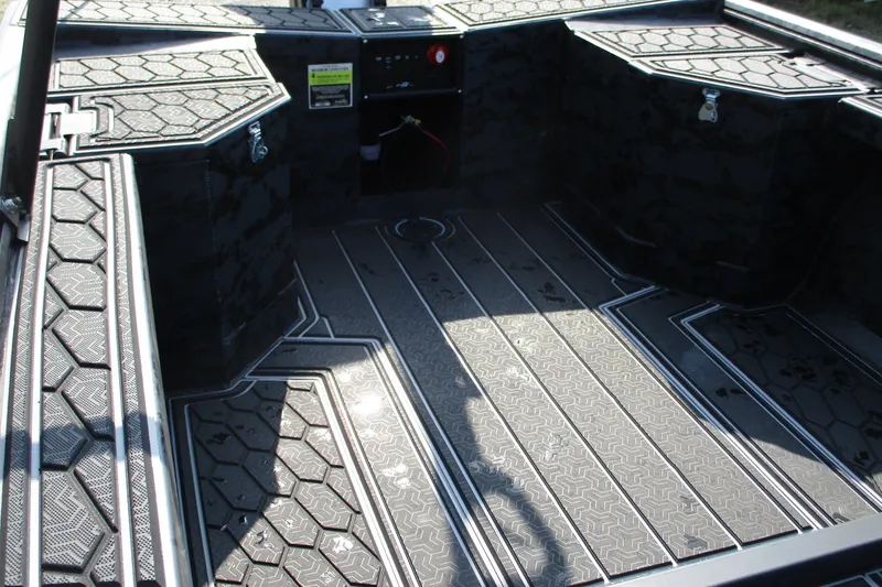 Slide: The Image of Interior of 2027 Gatortail 1854 Extreme boat with textured flooring and storage compartments. - 6