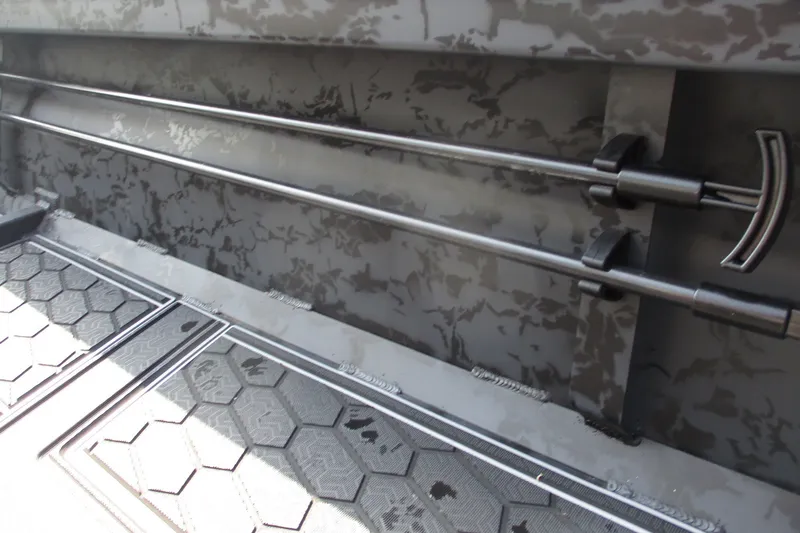 Slide: The Image of Interior of 2027 Gatortail 1854 Extreme boat with camo design and rod holders. - 10