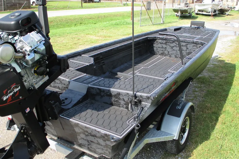 Slide: The Image of 2027 Gatortail 1854 Extreme boat on trailer, featuring a powerful engine and sleek design. - 3