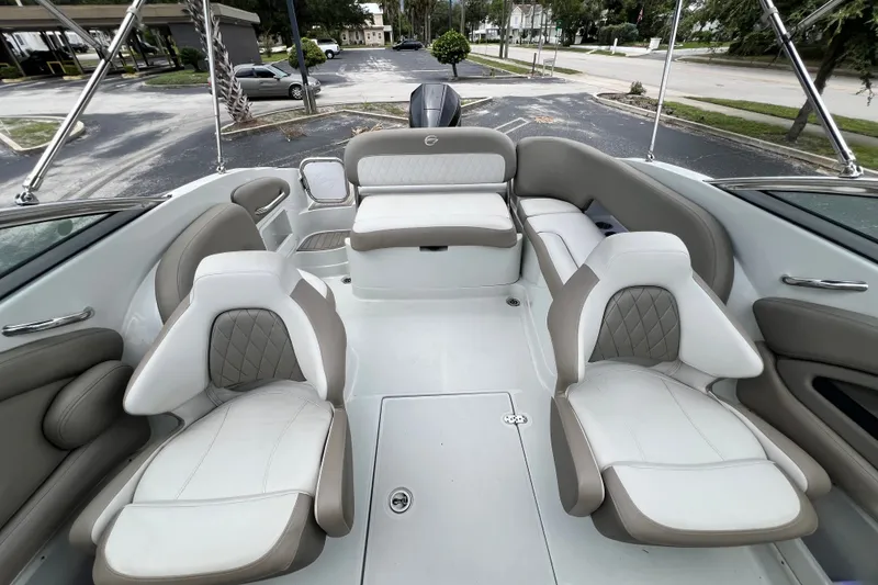 Slide: The Image of 2023 Crownline Eclipse E235 XS boat interior with luxurious seating and modern design. - 82