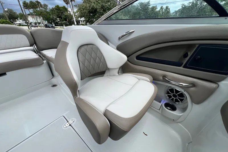 Slide: The Image of 2023 Crownline Eclipse E235 XS boat interior with luxurious seating and modern design. - 84