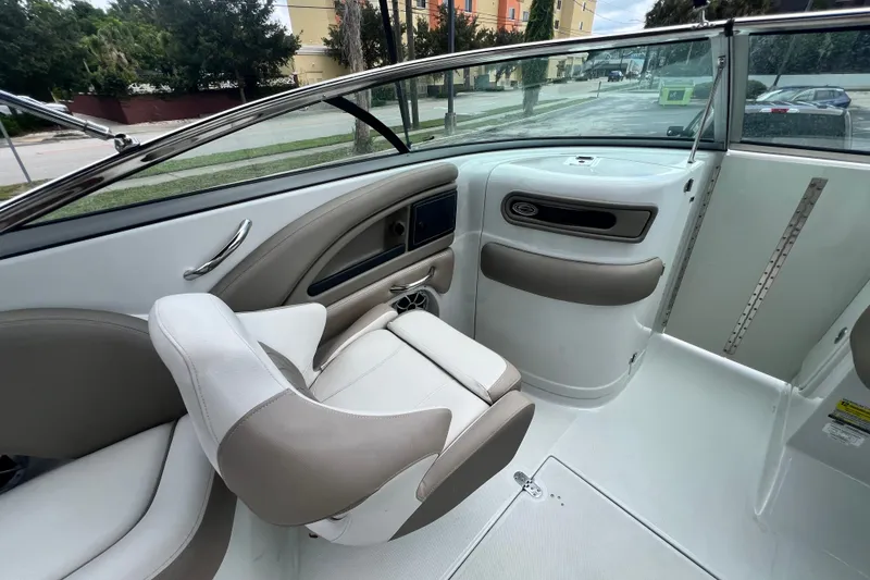 Slide: The Image of Interior of 2023 Crownline Eclipse E235 XS boat, featuring sleek seating and modern design. - 64