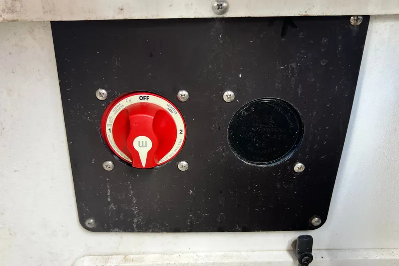 Slide: The Image of Battery switch panel on 2023 Crownline Eclipse E235 XS boat. - 87