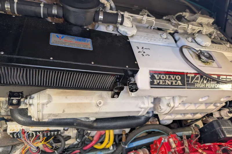 Slide: The Image of Engine compartment of a 2000 Pursuit 3400 Express with Volvo Penta high-performance engine. - 34