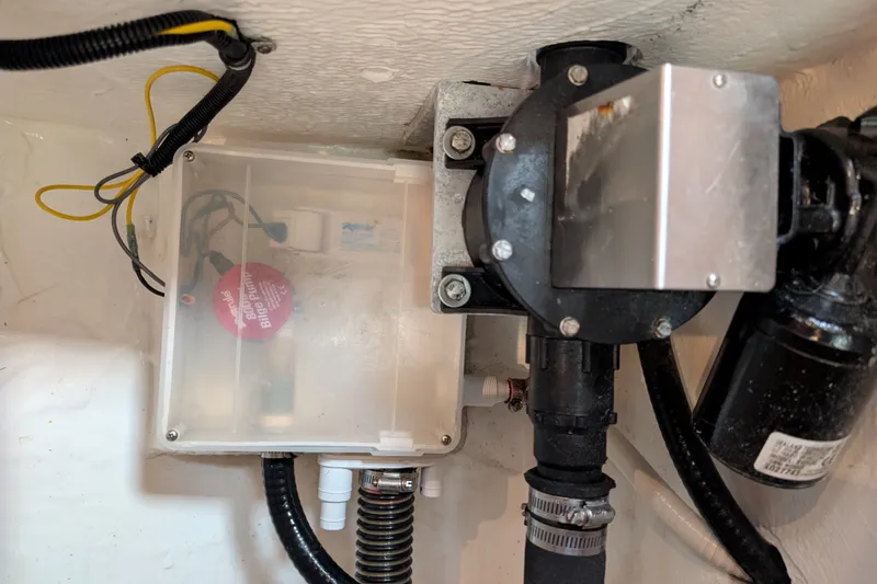 Slide: The Image of Boat bilge pump system in a 2000 Pursuit 3400 Express. - 42