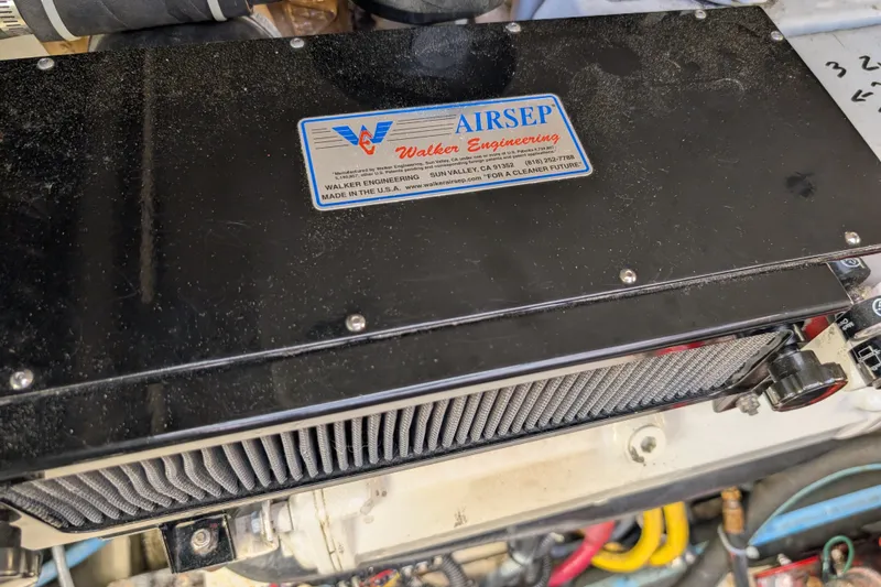 Slide: The Image of Engine compartment of a 2000 Pursuit 3400 Express with Walker Engineering AIRSEP system. - 37