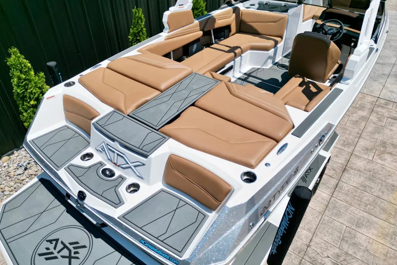 Slide: The Image of 2027 ATX Surf Boats 22 Type-S with tan seating and sleek design. - 8