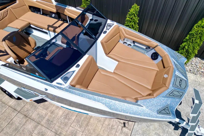 Slide: The Image of 2027 ATX Surf Boats 22 Type-S with luxurious tan seating and sleek design. - 6