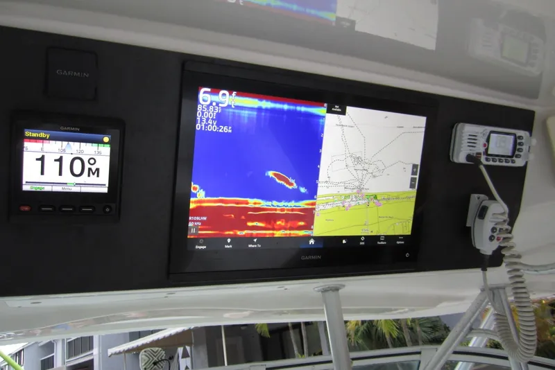 Slide: The Image of Garmin navigation system on 2005 Luhrs 32 Open boat, displaying sonar and map data. - 12