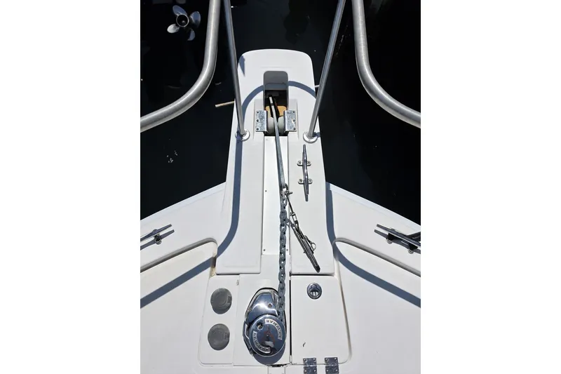 Slide: The Image of Bow of 2005 Luhrs 32 Open boat with anchor chain and cleat. - 6