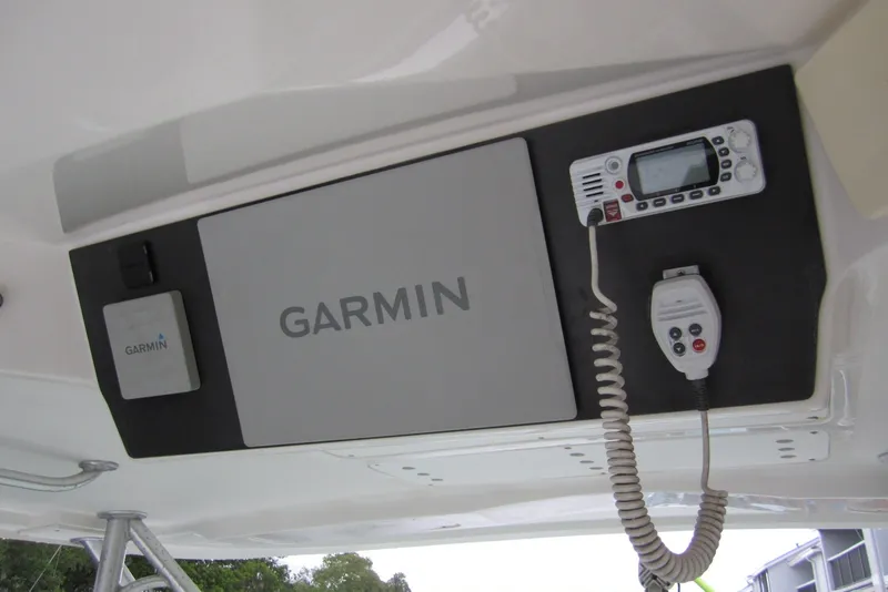Slide: The Image of Garmin navigation equipment on a 2005 Luhrs 32 Open boat dashboard. - 11