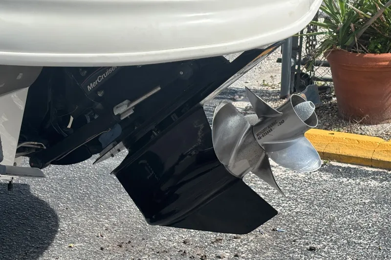 Slide: The Image of Close-up of a 2006 Sea Ray 240 Sundeck boat propeller and outdrive. - 46