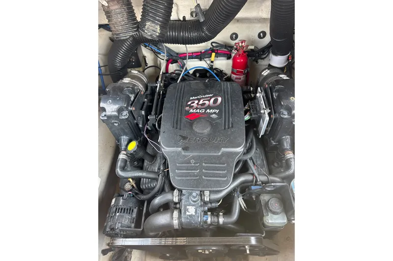 Slide: The Image of Engine compartment of a 2006 Sea Ray 240 Sundeck with MerCruiser 350 MAG MPI. - 25