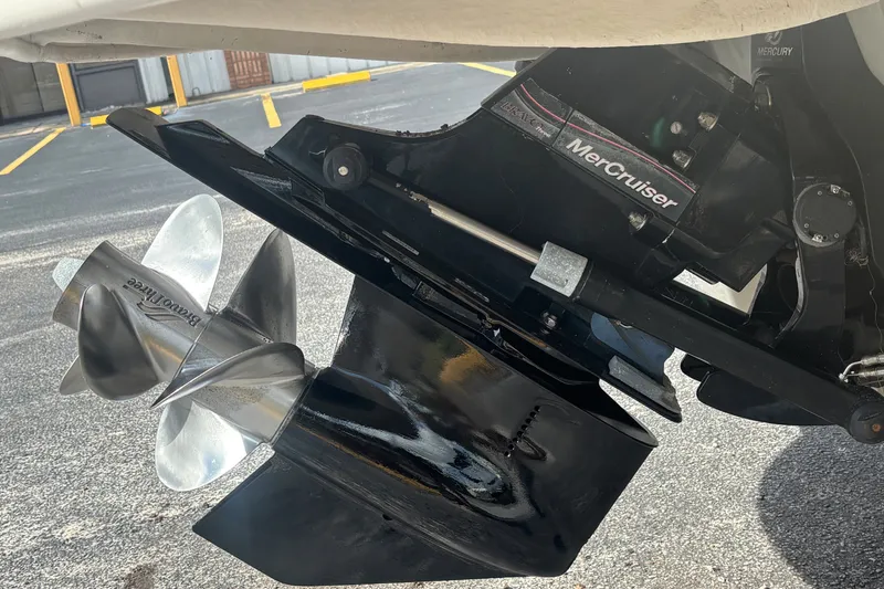 Slide: The Image of Close-up of a 2006 Sea Ray 240 Sundeck MerCruiser propeller and outdrive. - 47