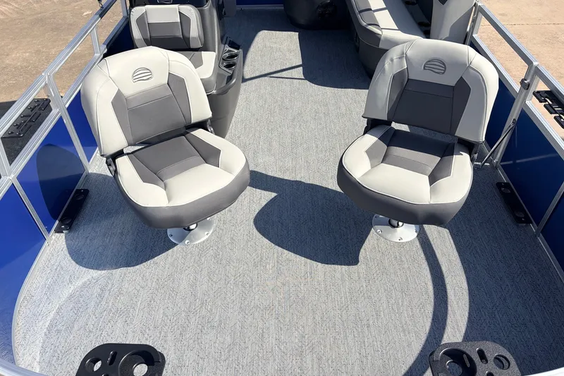 Slide: The Image of 2027 Sun Tracker Party Barge 16 DLX interior with comfortable seating and modern design. - 13