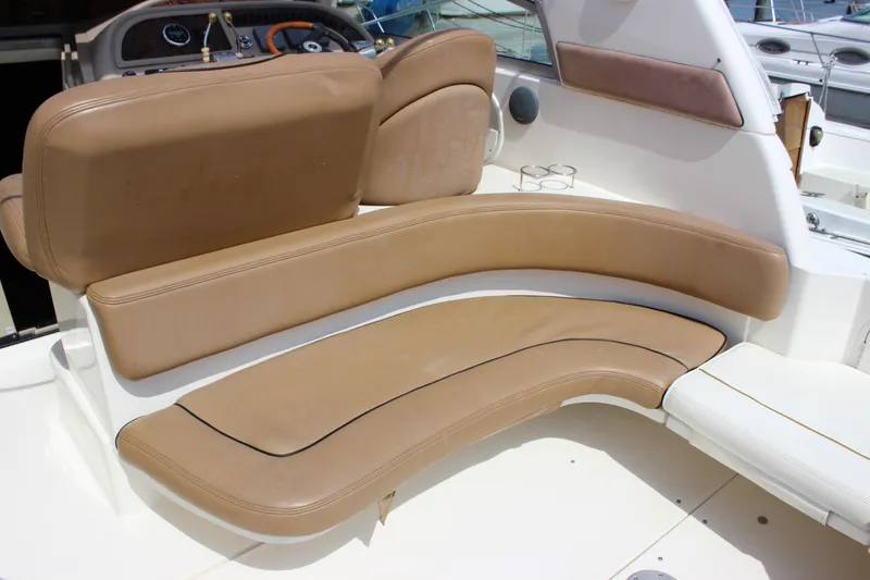 Slide: The Image of Luxurious tan seating on a 2000 Sea Ray Sundancer 310 boat deck. - 6