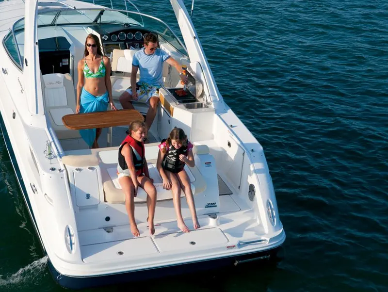 Slide: The Image of Manufacturer Provided Image: Family enjoying a day on a 2012 Sea Ray 310 Sundancer boat. - 31
