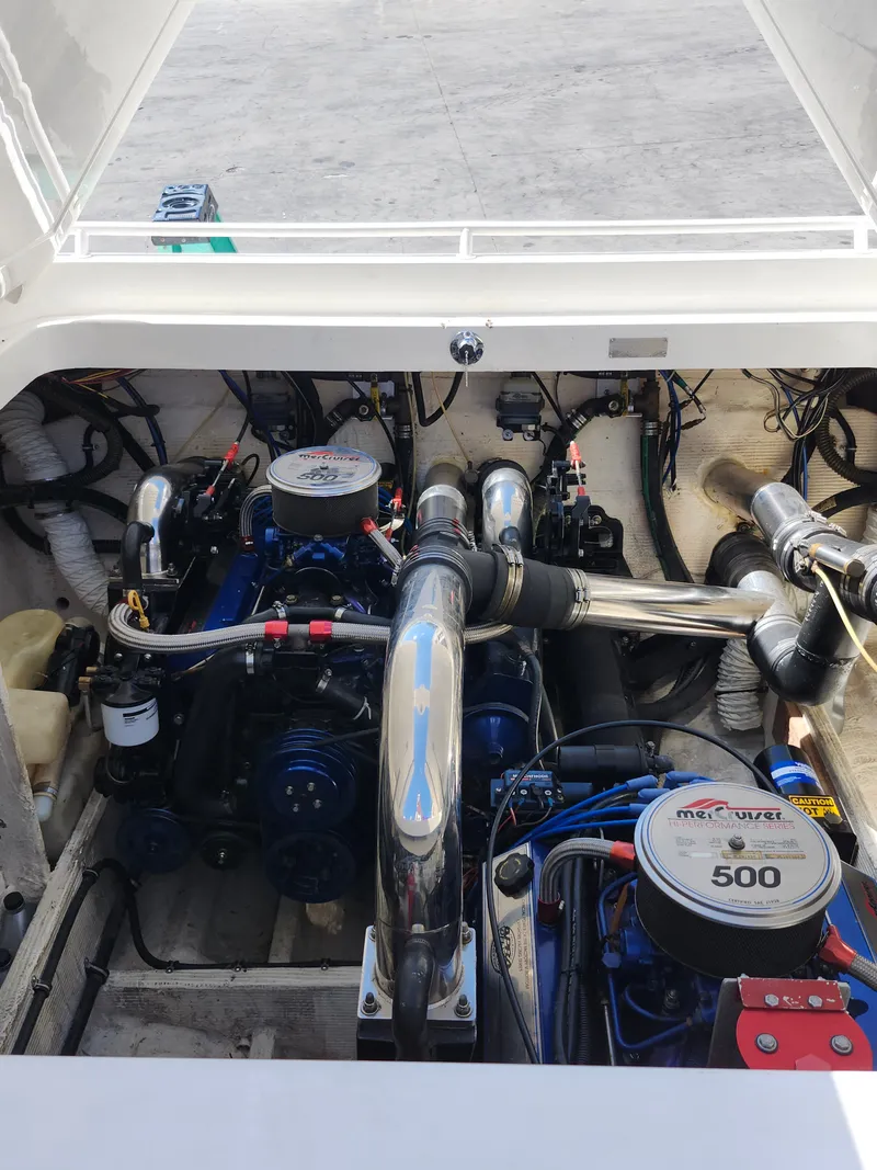 Slide: The Image of Engine compartment of a 1999 Fountain 42 Lightning with two powerful engines and tidy wiring. - 2