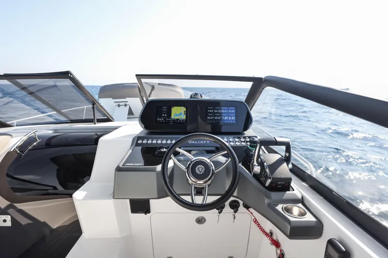 Slide: The Image of 2025 Valiatt 350GT boat cockpit with modern navigation system and steering wheel. - 8