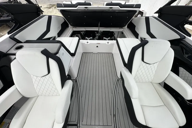 Slide: The Image of Luxurious interior of 2025 Yamaha Boats 252SD with sleek white seating and modern design. - 9