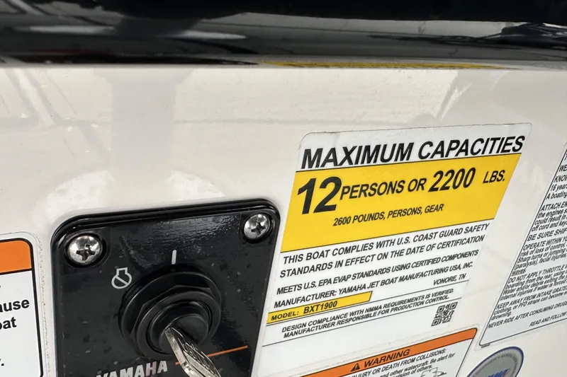 Slide: The Image of 2025 Yamaha Boats 252SD capacity label, showing maximum 12 persons or 2200 lbs. - 14