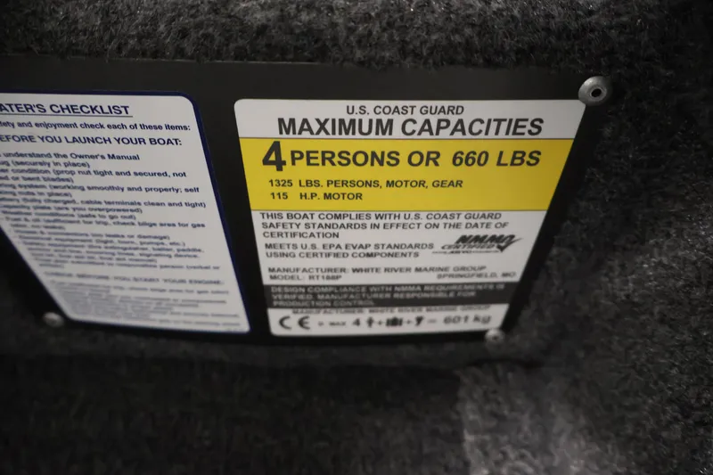 Slide: The Image of Capacity label on 2023 Ranger RT188P boat, indicating 4 persons or 660 lbs limit. - 33