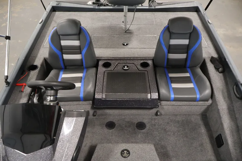 Slide: The Image of 2023 Ranger RT188P boat interior with dual seats and steering console. - 34