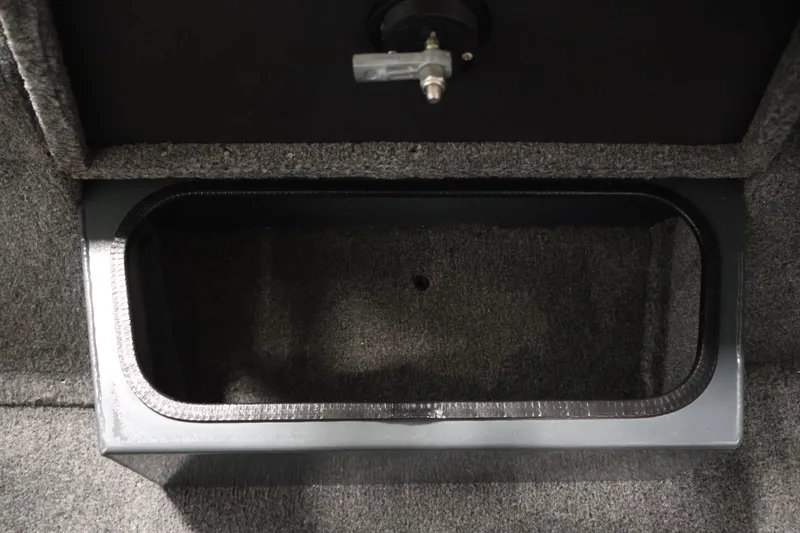 Slide: The Image of Storage compartment in 2023 Ranger RT188P boat, featuring a secure latch and carpeted interior. - 23