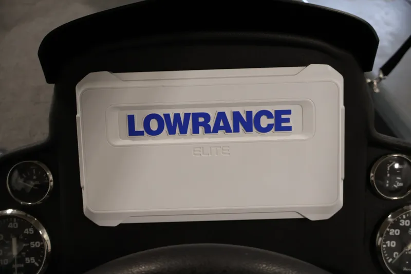 Slide: The Image of Lowrance Elite display on 2023 Ranger RT188P boat dashboard with gauges. - 29