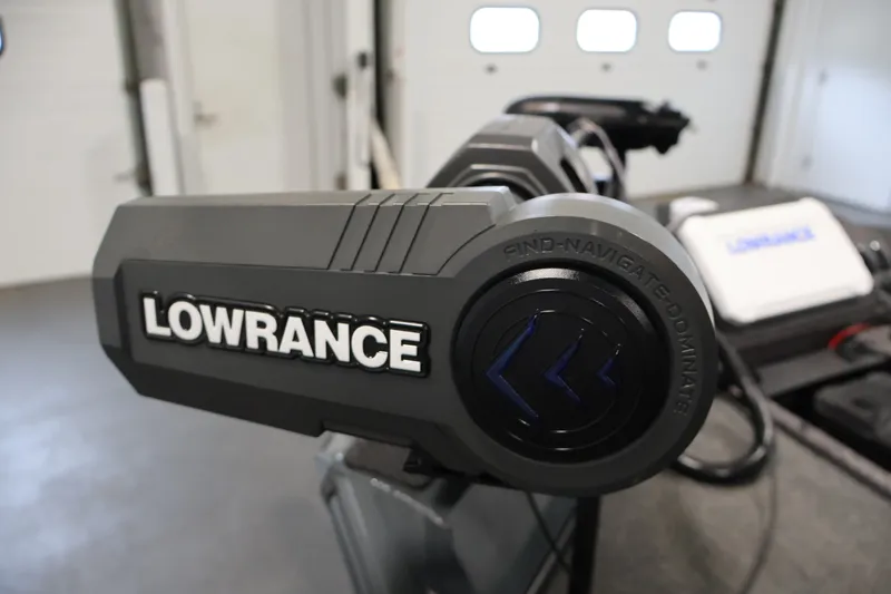 Slide: The Image of Lowrance equipment on 2023 Ranger RT188P boat, featuring advanced navigation technology. - 13
