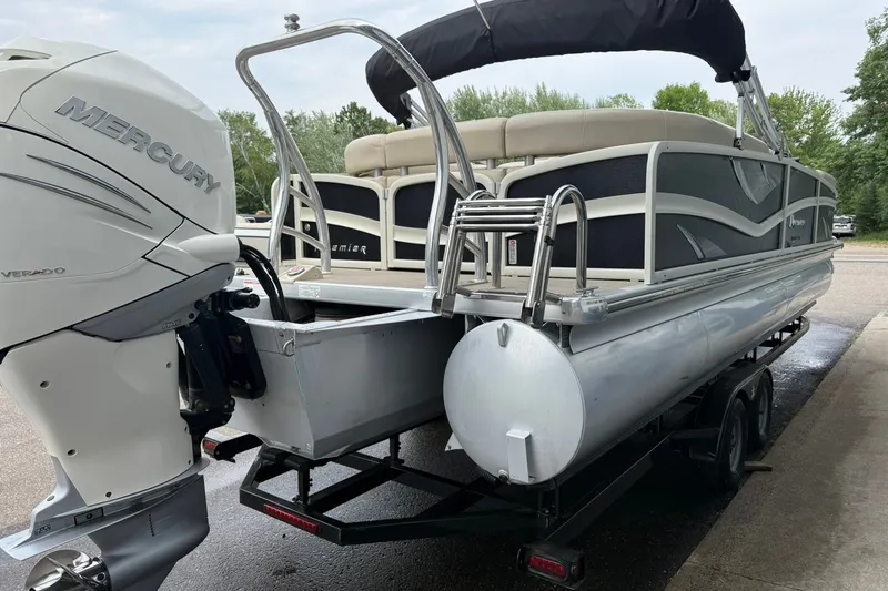 Slide: The Image of 2016 Premier 270 Intrigue RF pontoon boat with Mercury Verado engine on trailer. - 8