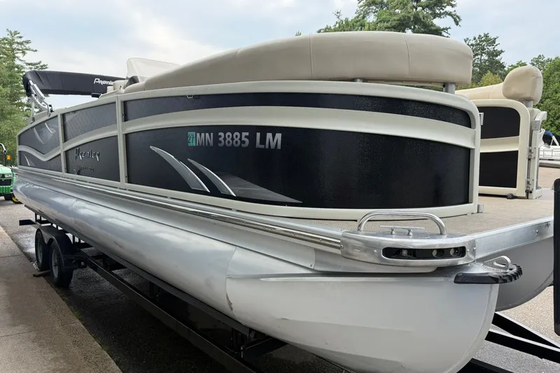 Slide: The Image of 2016 Premier 270 Intrigue RF pontoon boat on trailer, side view. - 9