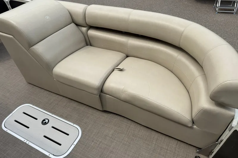 Slide: The Image of Luxurious beige seating on 2016 Premier 270 Intrigue RF boat, featuring plush upholstery and elegant design. - 12
