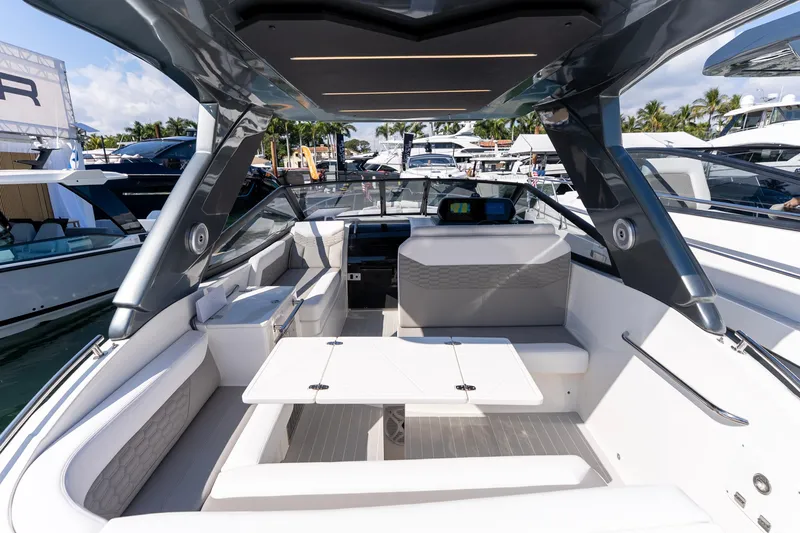 Slide: The Image of Luxurious interior of 2026 Valiatt 350GT yacht, featuring sleek seating and modern design elements. - 12