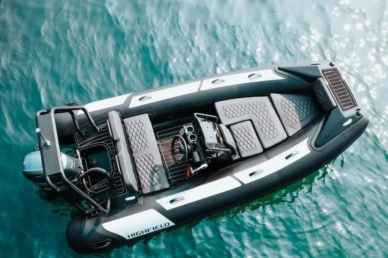 Slide: The Image of Manufacturer Provided Image: 2025 Highfield Sport 390 boat on clear blue water, aerial view. - 13