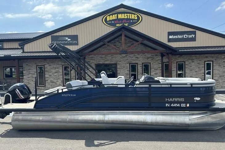 The Image of 2020 Harris Solstice 230 SL pontoon boat parked outside Boat Masters Marine. - 1